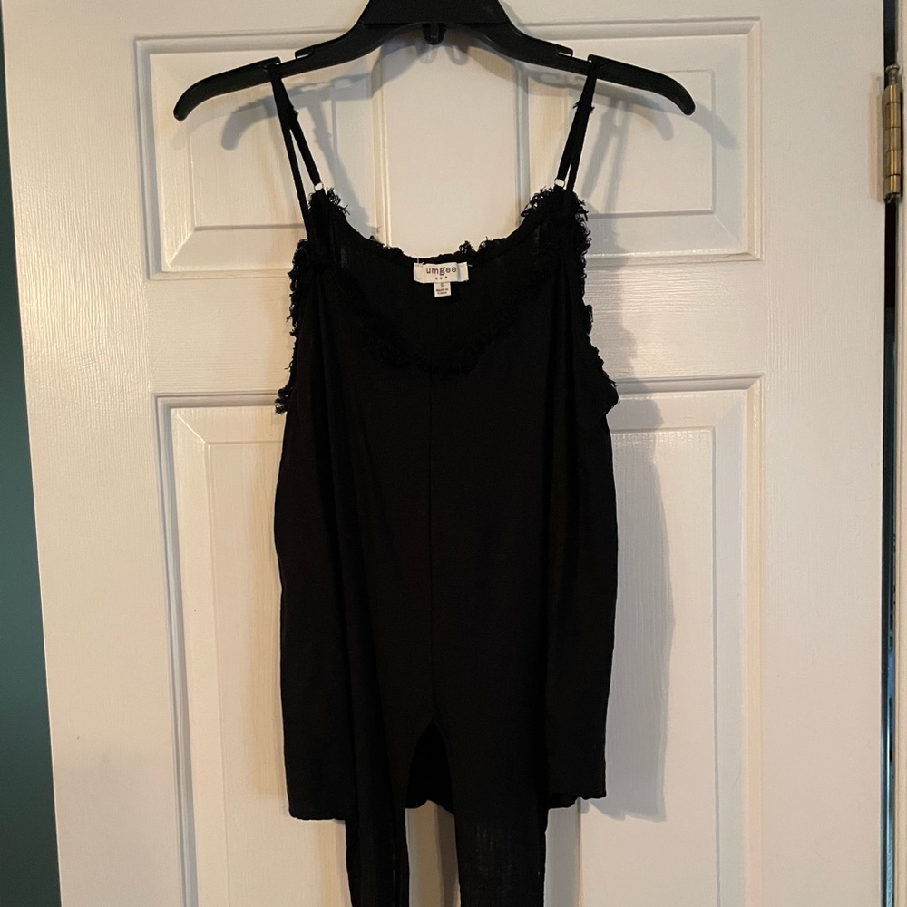 Umgee tie front tank top with fringe detail.